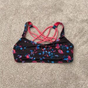 Women’s Lululemon Black, Pink, and Blue Free To Be Sports Bra size 6